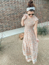 Load image into Gallery viewer, The Mai Smocked Dress In Coral Tie Print