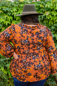 The Mallory Floral Blouse In Rust