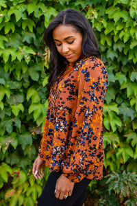 The Mallory Floral Blouse In Rust